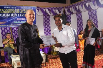  Joel presenting reward at SOW gratduation in East Asia on 6/21/2019 